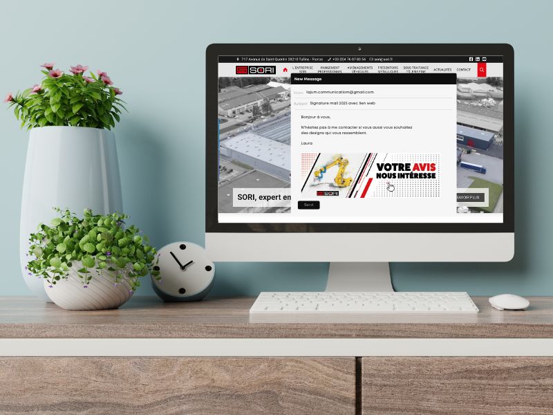Création de signature mail personnalisée visant à améliorer le SEO de Sori avec un robot stylisé.